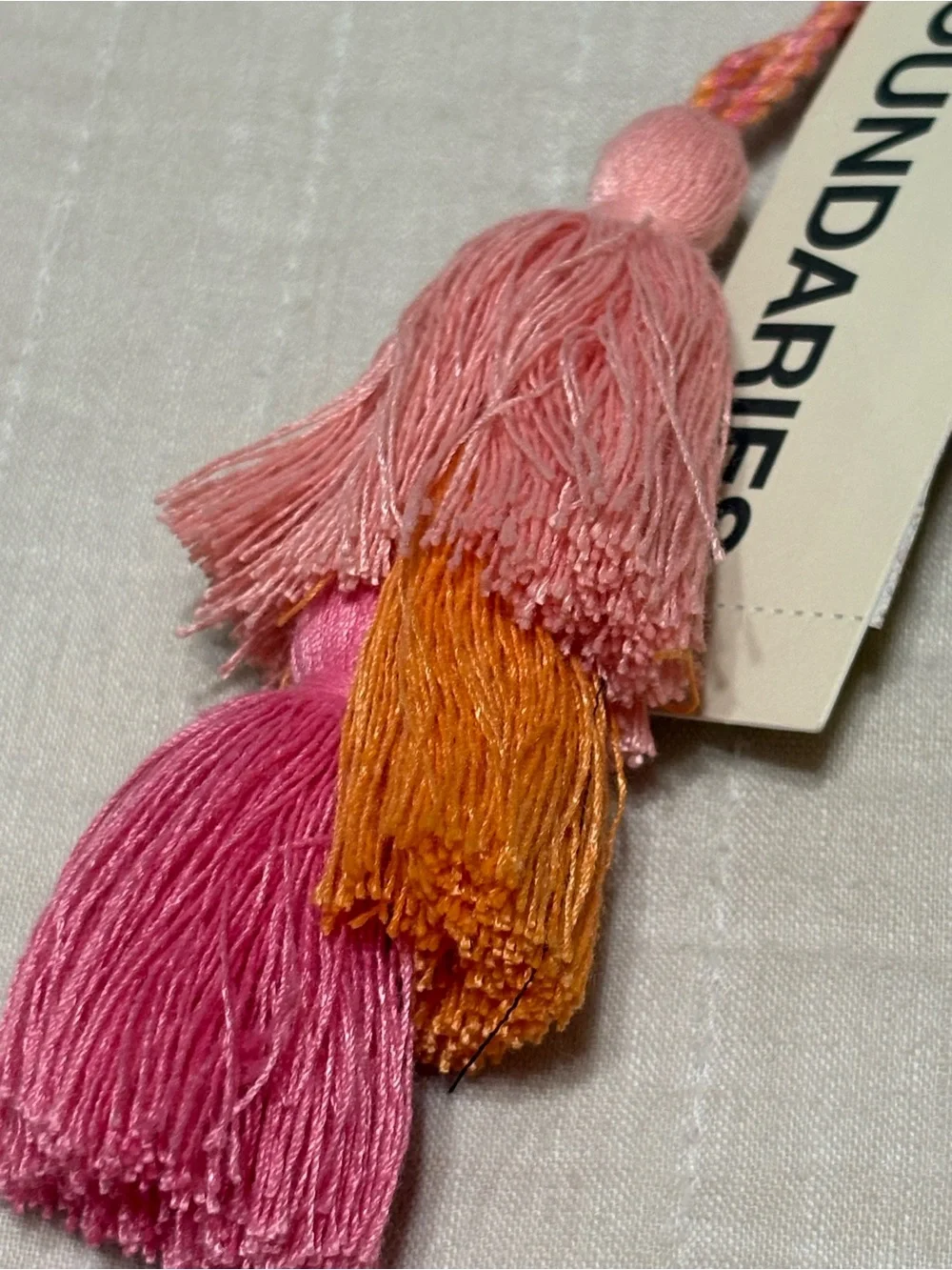 No Boundaries Pink, Peach & Orange Woven Cosmetic Pouch with Tassel